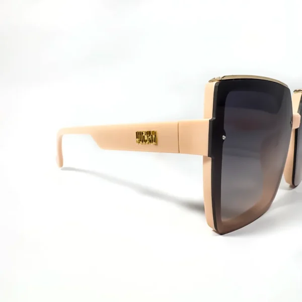 Oversized square sunglasses with a Pink-colored frame, brown-to-clear gradient lenses