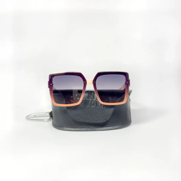 Oversized square sunglasses with a Pink-colored frame, brown-to-clear gradient lenses
