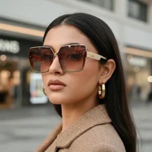 Oversized square sunglasses with a cream-colored frame, brown-to-clear gradient lenses